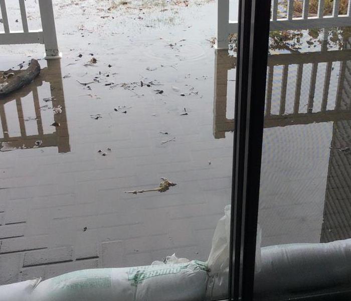 High water level flooded condo through patio door