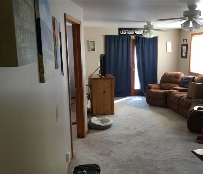 living room flooded from outside water