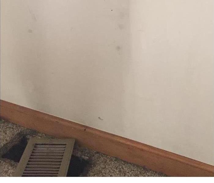 soot on walls from smoke coming through heat register